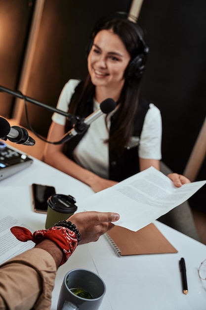 Two people in conversation across a desk